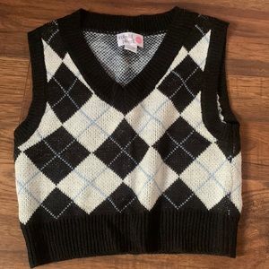 black, white, blue sleeveless vest